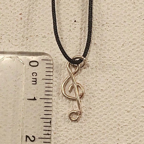 Silver treble clef pendant made to order