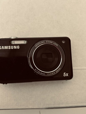Samsung Camera like new with charger, memory card, and manuals
