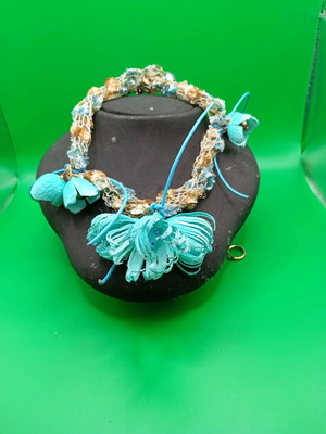 Handmade necklace with turquoise and gold silk cocoon flowers