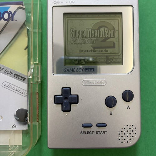 Nintendo Game Boy Pocket silver with original hard case and 8 games