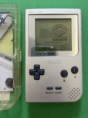 Nintendo Game Boy Pocket silver with original hard case and 8 games