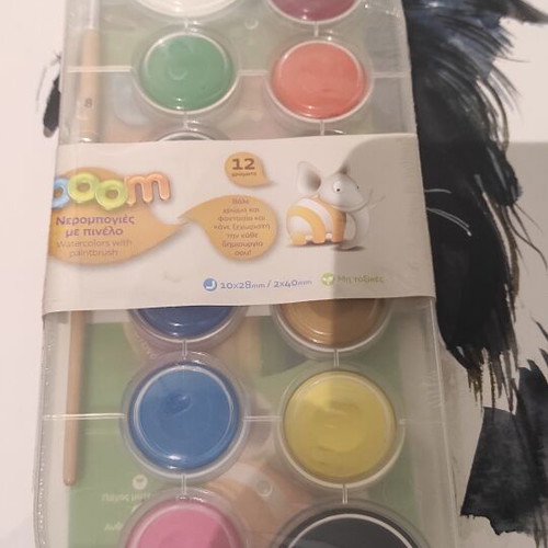 Art supplies set like new with oil pastels, watercolors, colored pencils, and watercolor block