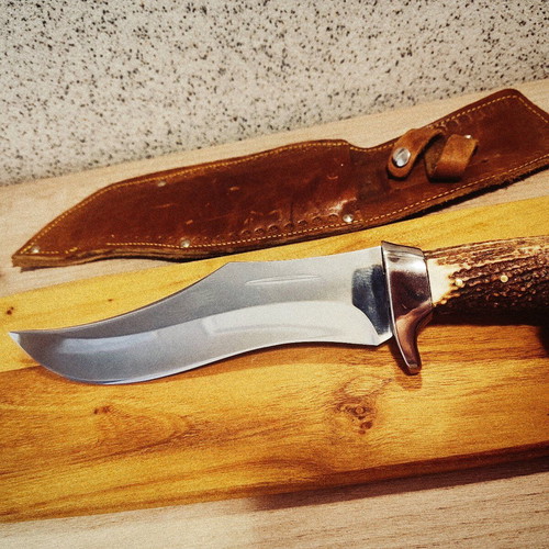 Massive hunting knife new from collection with elk horn handle and calf leather sheath