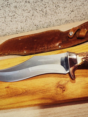 Massive hunting knife new from collection with elk horn handle and calf leather sheath
