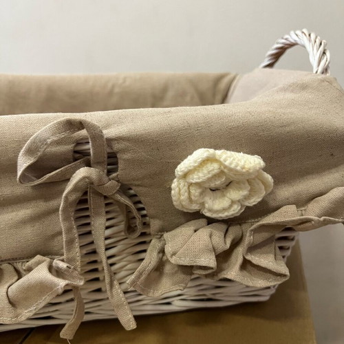 Wicker basket new with linen fabric lining and handmade knitted flower