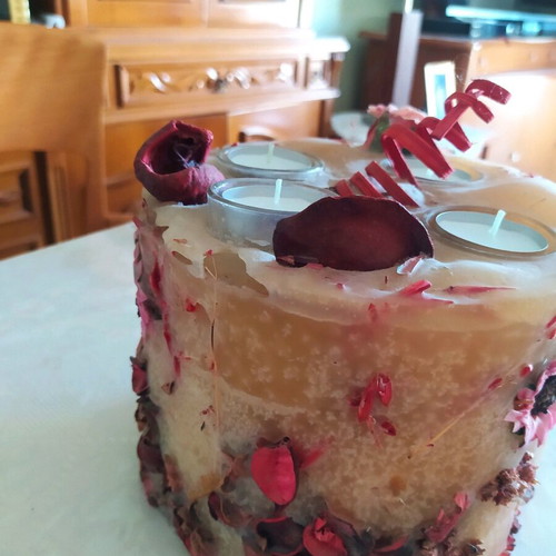 Decorative candle with dried flowers used