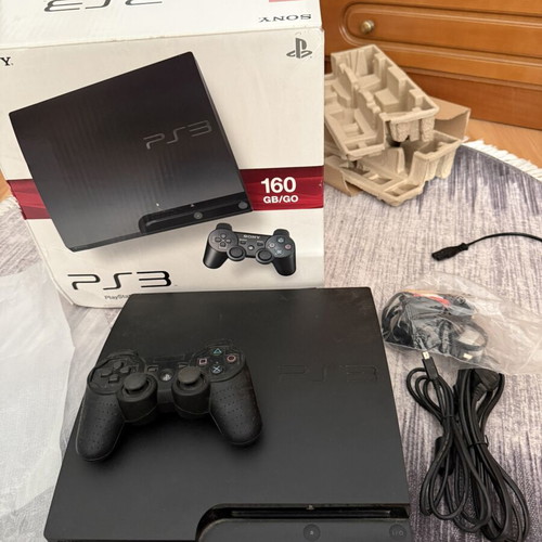 Sony PlayStation 3 Slim 160GB console used with original controller