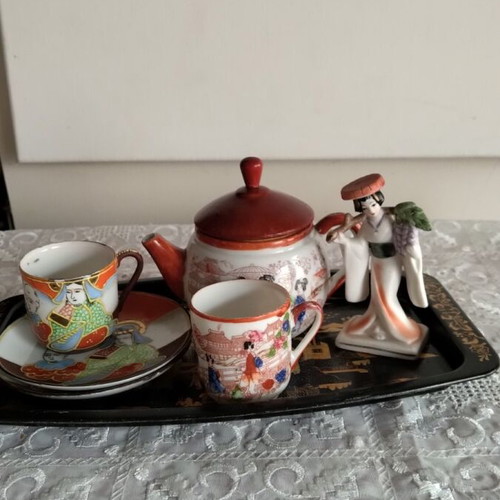 Decorative miniature tea set like new, fine porcelain