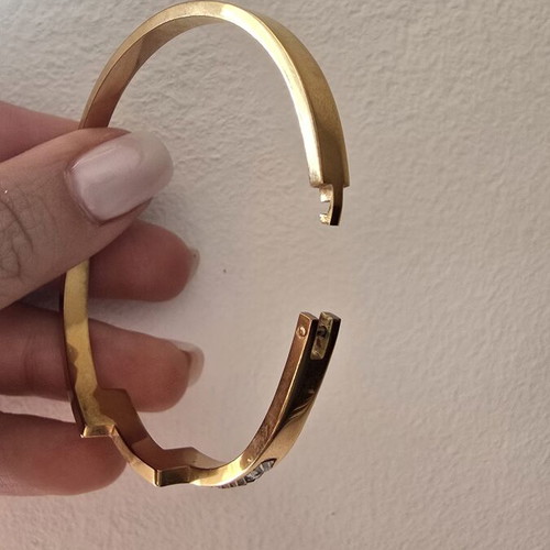 Steel bracelet in rose gold color with decorative stones, like new