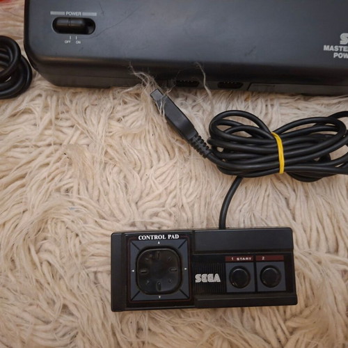 Sega Master System II used with 2 cartridges and new power supply