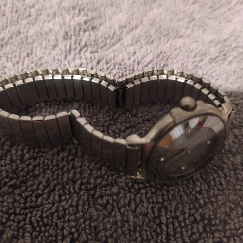 Women's watch used with elastic grey silver bracelet