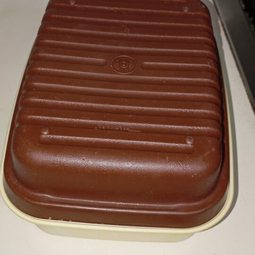 Tupperware cheese container used