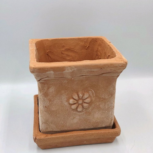 Square ceramic pot new from high-quality clay with saucer