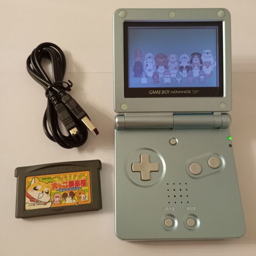 Gameboy Advance SP console with Inukko Club game and USB charger