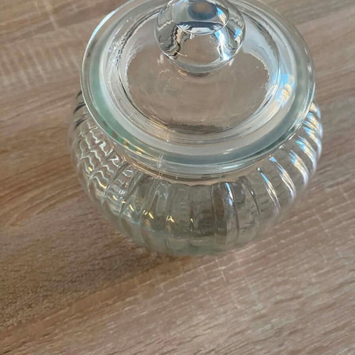 Glass Airtight Storage Jar like new, embossed design, 11.5cm height