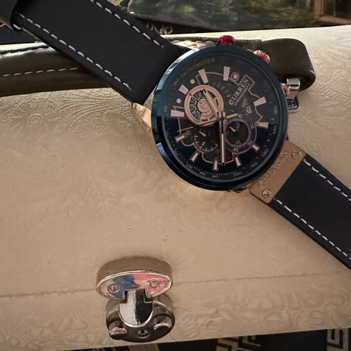 Curren men's watch new with leather strap blue and red