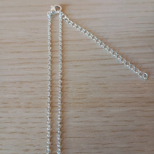 Steel cross like new, silver color