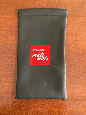 Mati Mati soft rubber eyeglass case like new, black with red logo