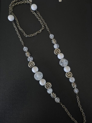 Women's necklace with silver chain and beads