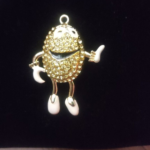 The Smiling Child pendant necklace like new, gold with white enamel