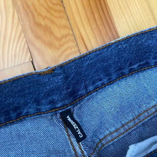 Jeans with rips in excellent condition, size M