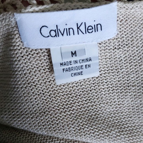 Calvin Klein tunic used with hand-knitted lace and wooden beads