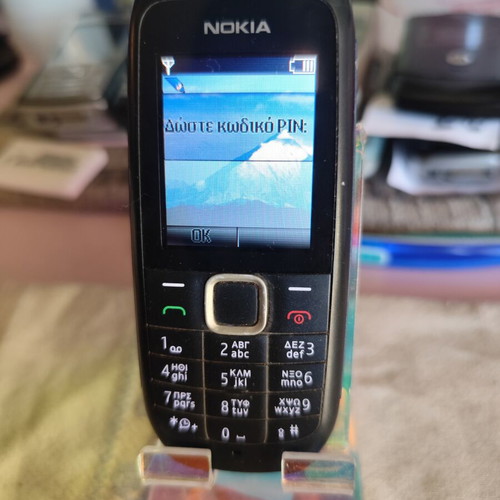Nokia 1616-2 used with charger and new battery