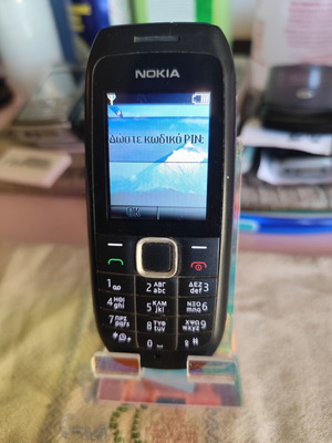 Nokia 1616-2 used with charger and new battery