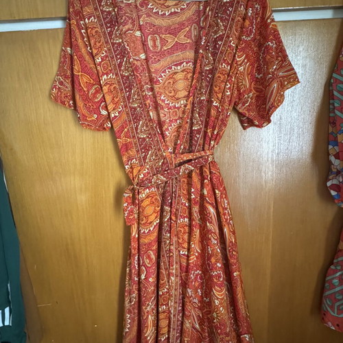 Wrap dress with paisley pattern, red and orange
