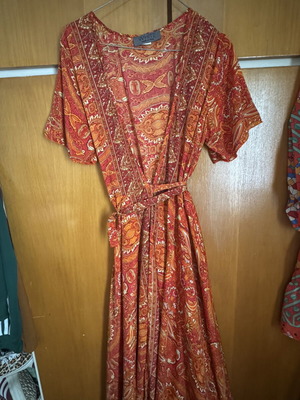 Wrap dress with paisley pattern, red and orange