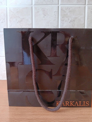 Karkalis luxury paper gift bag used with brown cord handles