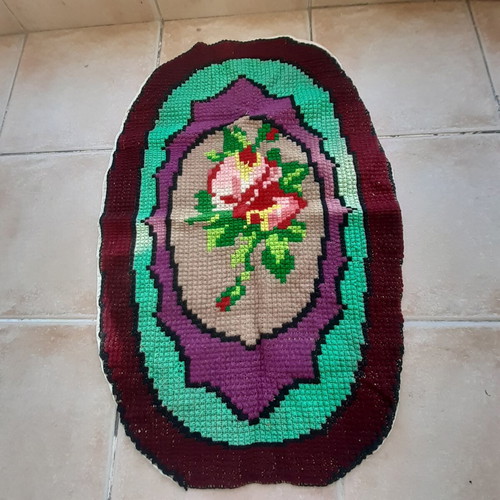 Handmade oval embroidered rug like new