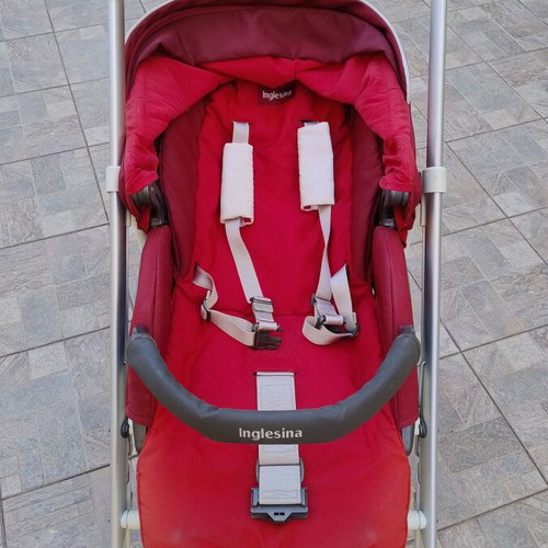 Inglesina Trilogy stroller used with extras and rain cover