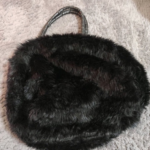 Women's fuzzy black bag like new