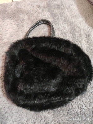 Women's fuzzy black bag like new