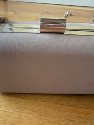 Beige handheld bag used in fairly good condition