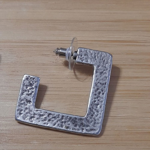 Earrings like new with unique shape and hammered silver design