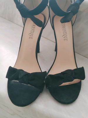Black sandals used size 40 with bows made of synthetic leather