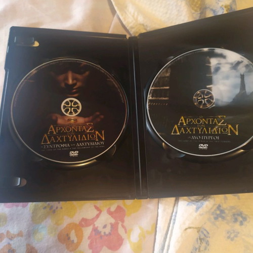 Lord of the Rings collection used, first two movies with double DVD making of