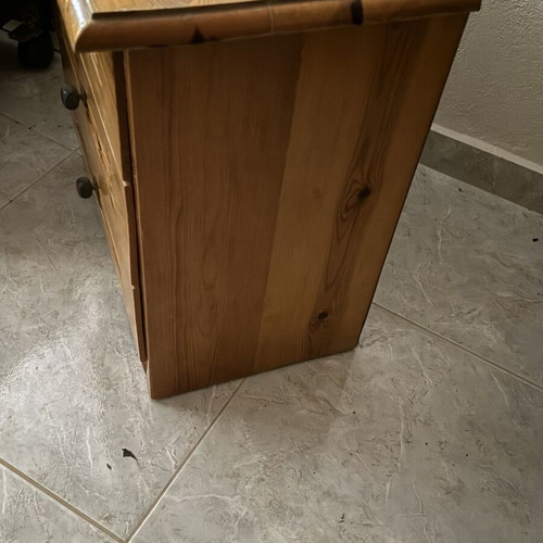 Wooden nightstand used with three drawers, classic design