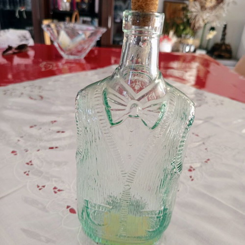 Vintage glass bottle Bormioli Rocco with vest and bow tie design, like new