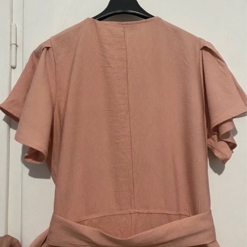 Women's one-piece jumpsuit new, salmon color with wooden buttons, size M