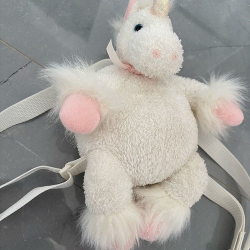 Children's plush unicorn backpack used in excellent condition