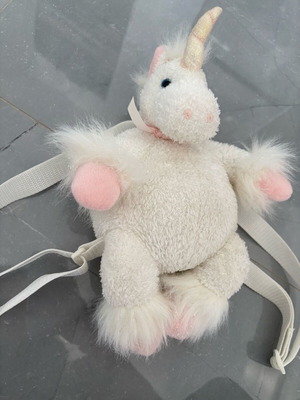 Children's plush unicorn backpack used in excellent condition