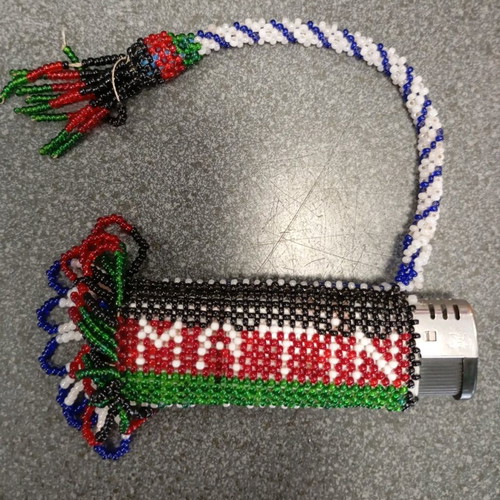Beaded knitted case used, possibly for lighter or perfume bottle