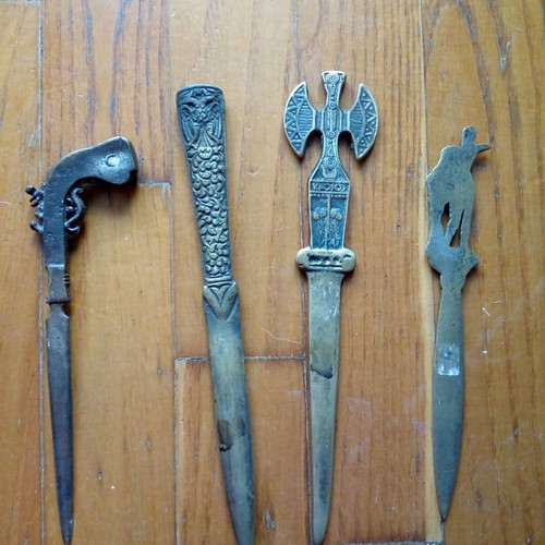 Brass letter openers used, set of 4 with 1970 themes
