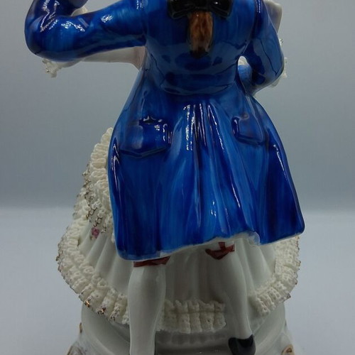 Vintage porcelain music figurine of dancing couple, like new