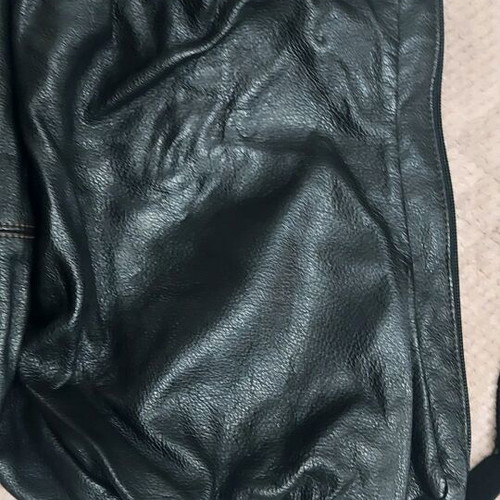Mandarina Duck leather bag black like new with castor and pony skin