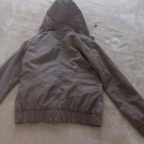 Waterproof jacket used, size M-L, beige with print