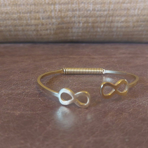 Gold infinity handcuff bracelet like new